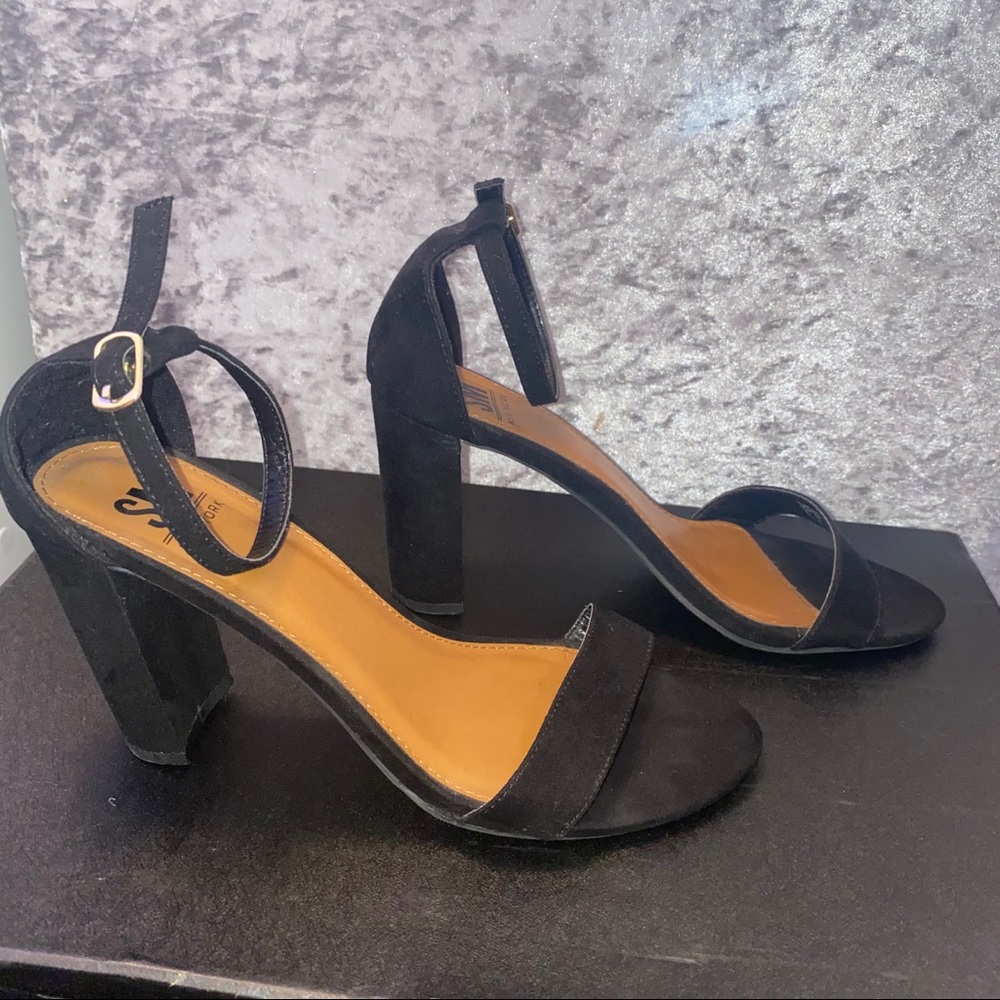 Steve Madden black strappy heels. Lightly worn.